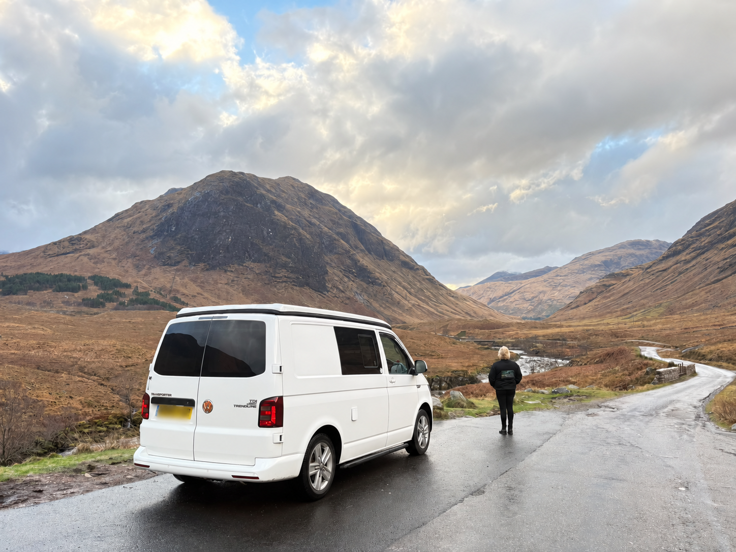 Victoria and her campervan in the Scottish Highlands