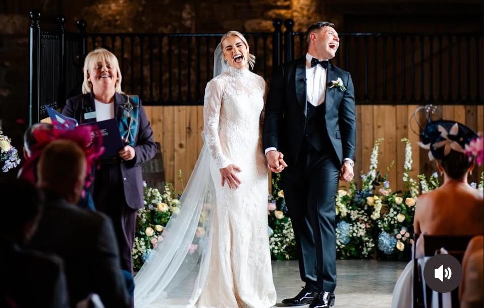 A happy newly married couple with Victoria